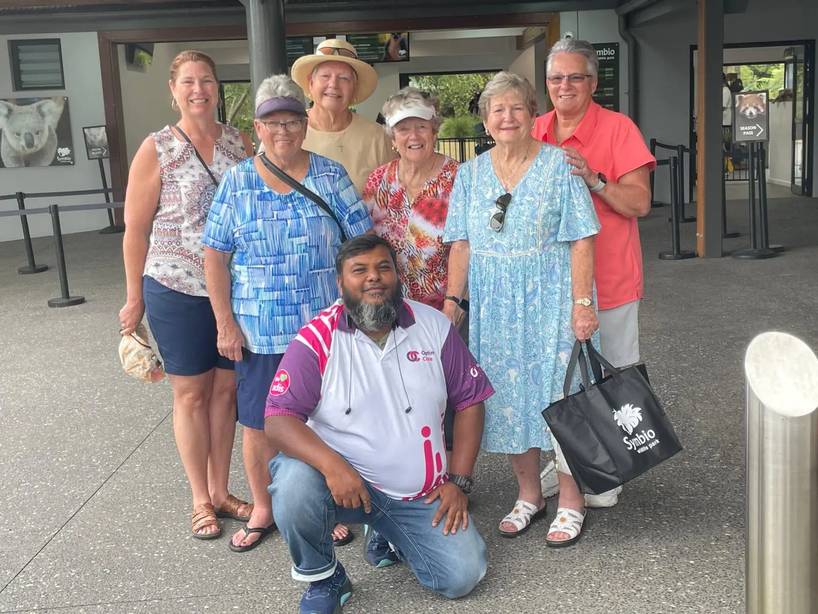 Optimal Care team and participants together on a group outing
